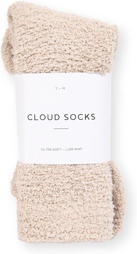 Ultra-soft cloud socks in a neutral beige shade, a cozy Airawath wellness essential designed to enhance comfort and mindfulness during slow, intentional mornings.
