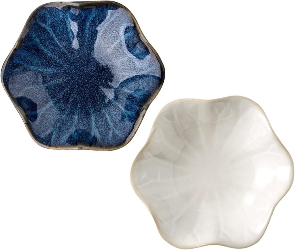Set of two decorative ceramic trinket dishes in organic flower shape, one blue and one white, elegant home décor and gift accent