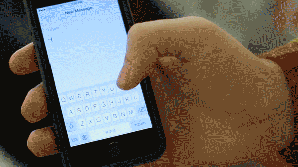 Hand typing a message on a smartphone, creating a digital invitation or personalized greeting with Airawath.